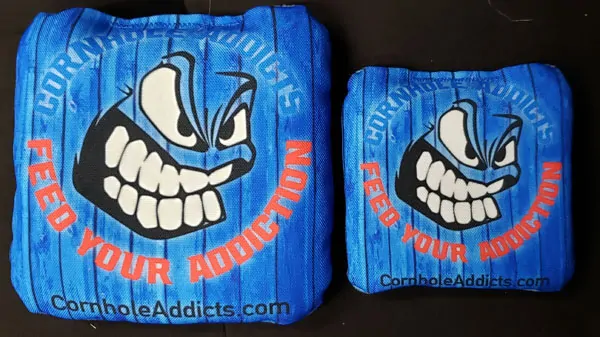 Regular sized Run N Gun Series cornhole bags along side mini bags