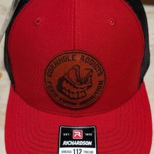 Red on black leather patch hats