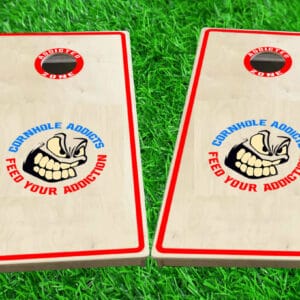 Red trim boards with cornhole addicts logo