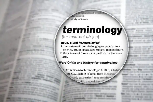 a close-up of a dictionary showing cornhole terminology