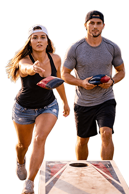 Man and woman throwing bags